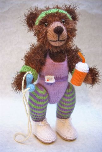 knitted toy of teddy in a keep fit outfit