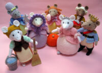 Knitted toys showing the cast of Cinderella