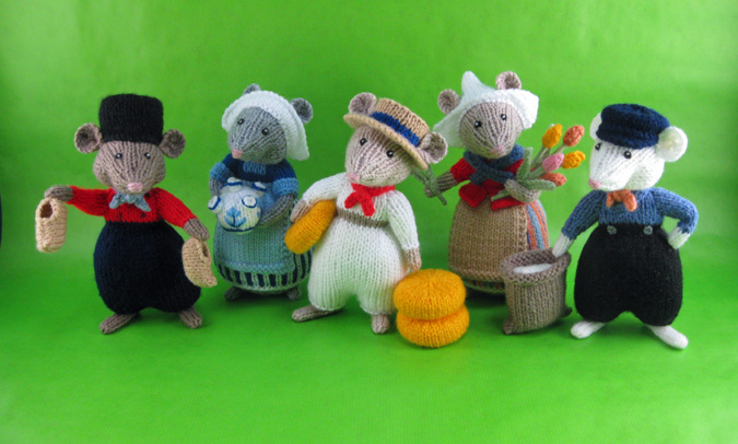 a group of mice knitted toys dressed traditional Dutch clothes