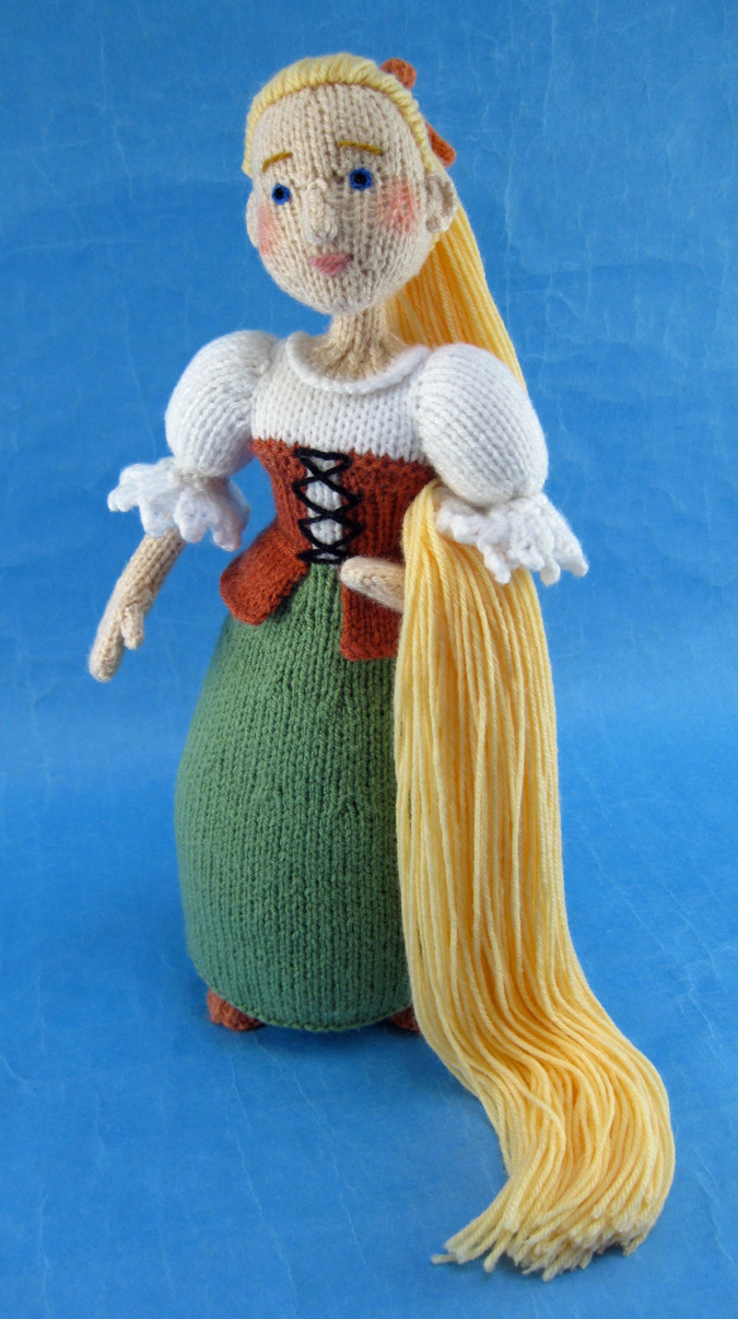 knitted toy of Rapunzel with her long hair