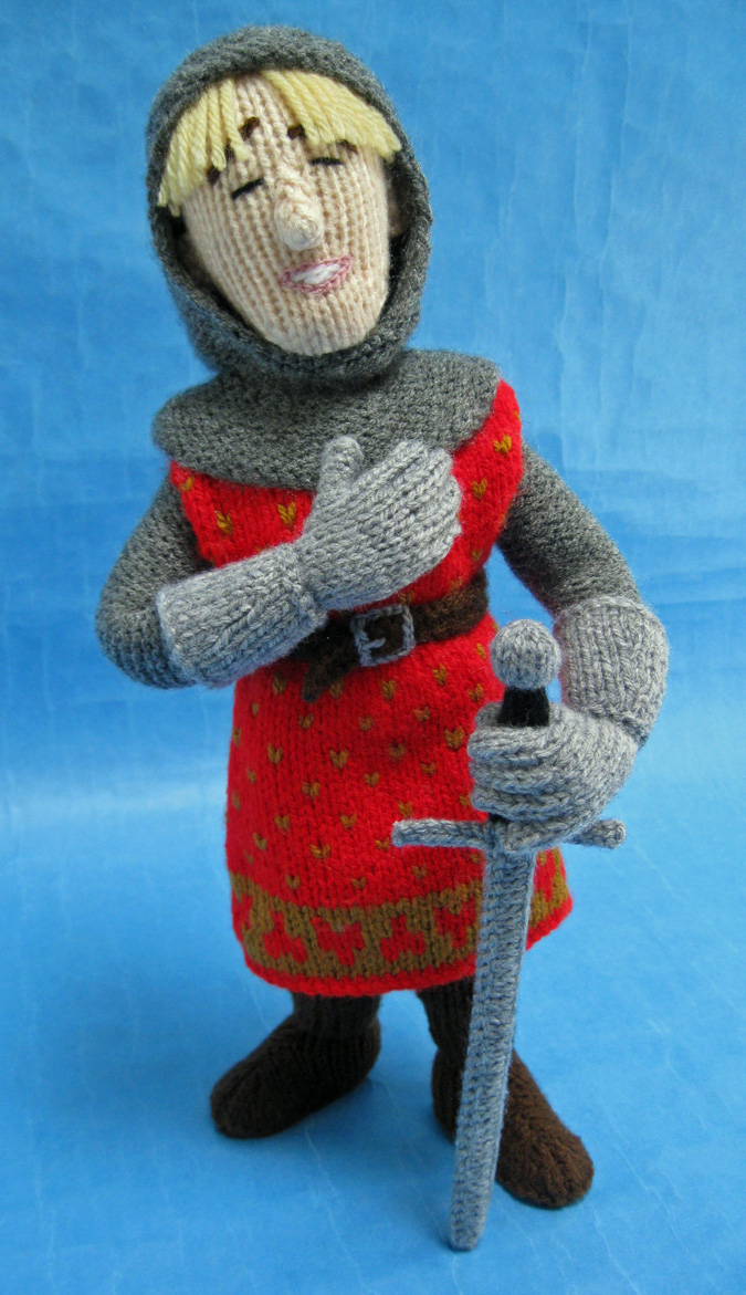 knitted toy of a knight in armour with a sword