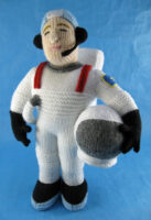 knitted toy of a spaceman in a space suit